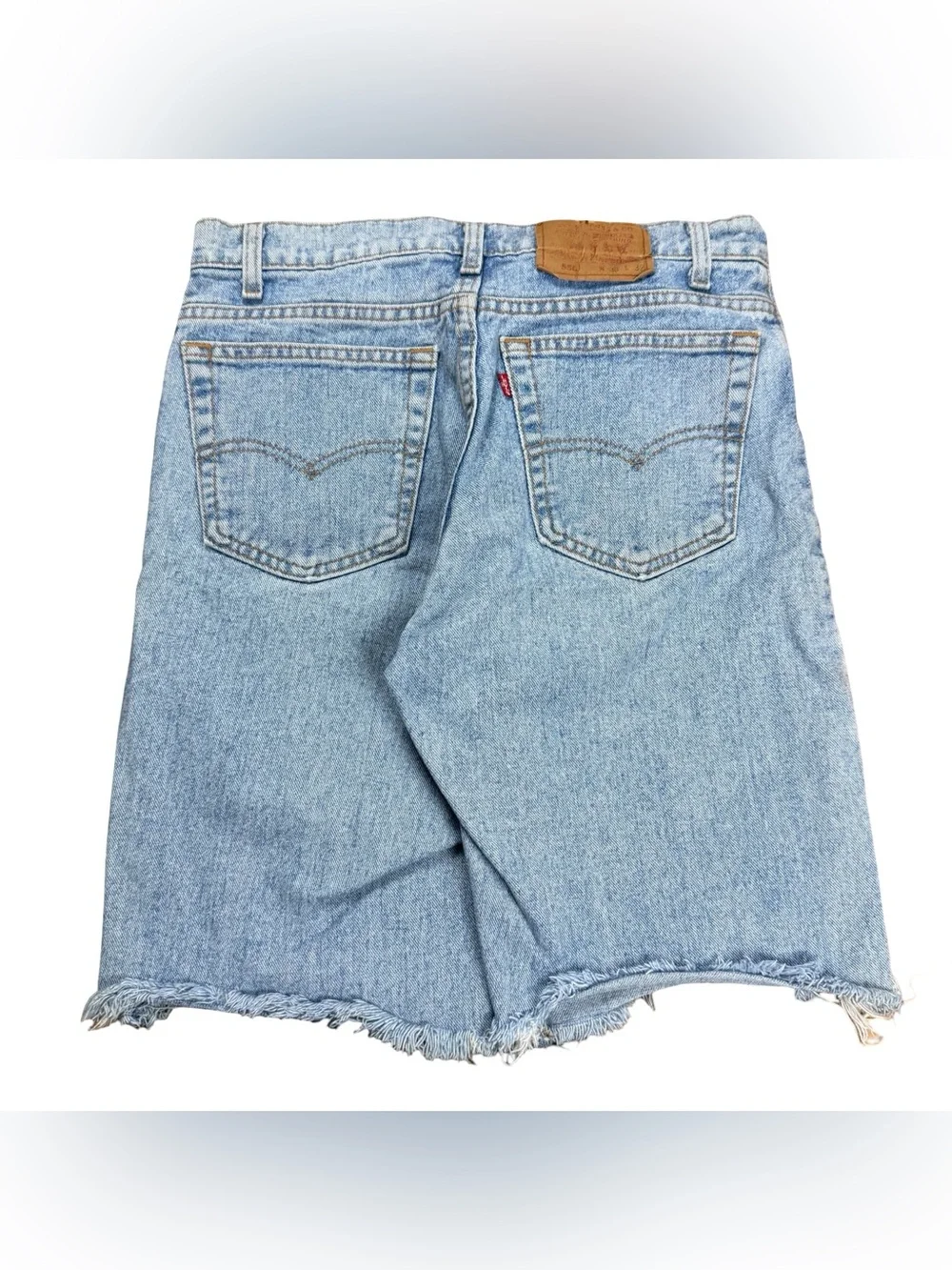 Vintage 90s Levi’s 550 Made In USA Light Wash Elongated Jean Shorts Size 33